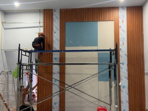 Thi công  vách tivi bằng tấm ốp nano