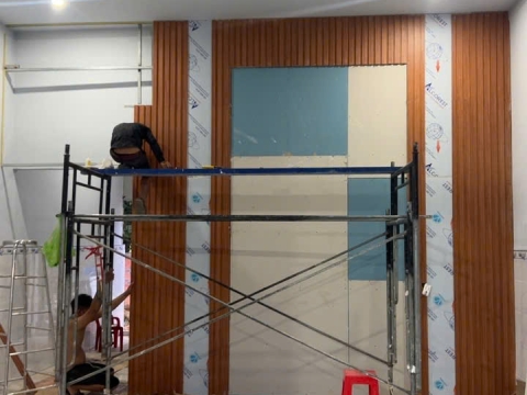 Thi công  vách tivi bằng tấm ốp nano